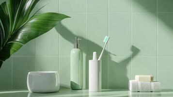 A green bathroom with a toothbrush, toothpaste and a towel photo