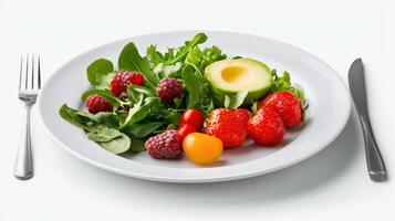 A plate with a salad of strawberries, raspberries, and avocado photo