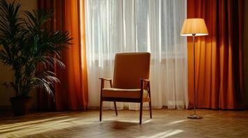 A chair sitting in front of a window photo