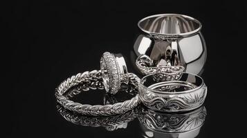A silver ring, a silver cup and a silver ring photo