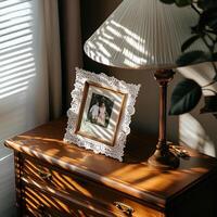 A picture frame on a dresser photo