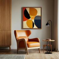 An orange chair in front of a painting photo