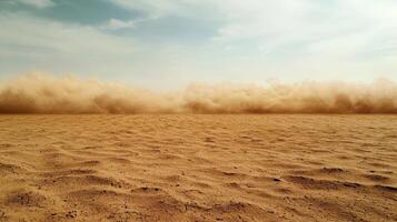 A desert with sand blowing in the wind photo