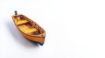 A small wooden boat on a white surface photo
