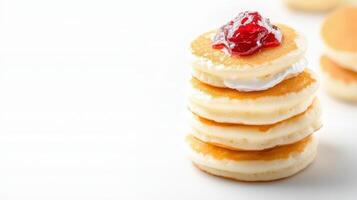 Stack of pancakes with jam on top photo