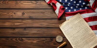 American flag and constitution on wooden table with copy space photo