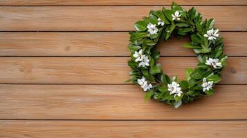 A wreath of flowers on a wooden wall photo