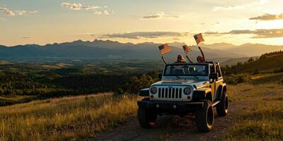 A jeep driving down a dirt road with two people on top photo