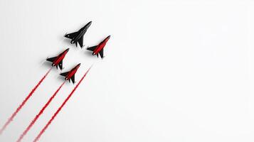 Four fighter jets flying in formation with red smoke trails photo