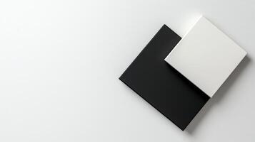 A black and white square on a white surface photo