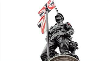 A statue of a soldier holding a british flag photo