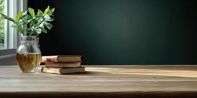 A vase of flowers and books on a table photo