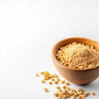 A bowl of brown rice with a spoon of brown rice on a white background photo