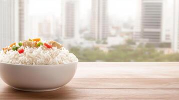 Chinese food bowl with rice and vegetables on wooden table with city view photo