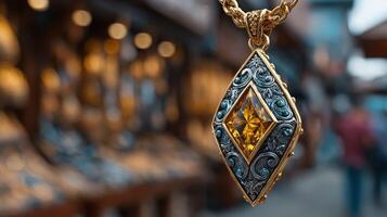 Jewelry pendant featuring intricate design and yellow gemstone displayed at market photo