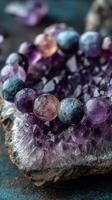 Beautiful amethyst and blue crystal bracelet on a purple crystal backdrop showcasing its unique charm and elegance photo