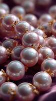 Elegant pearls with golden accents displayed on luxurious fabric in a delicate arrangement photo