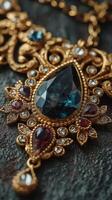 Intricate golden necklace featuring a large blue gemstone and detailed designs during a close-up shot photo