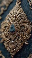 Intricate gold and black decorative art featuring a gem centerpiece, captured in a close-up perspective photo