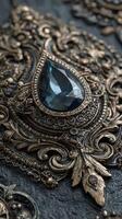 Intricate craftsmanship of ornate metalwork featuring a large gemstone with detailed floral designs photo