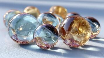 Vibrant glass marbles reflecting light on a smooth surface with warm and cool tones in an artistic arrangement photo
