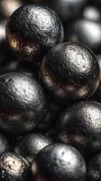 Metallic spheres in close-up display texture and shine, showcasing industrial material characteristics photo