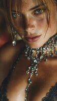 Close-up of an elegant model showcasing intricate jewelry in a soft, warm environment during a fashion event photo