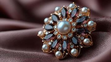 Elegant vintage brooch displayed on rich fabric showcasing intricate design and luxurious materials photo