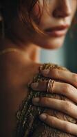 Elegant close-up of a woman showcasing delicate jewelry against a soft background during a tranquil afternoon photo
