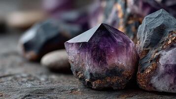 Stunning display of amethyst and quartz crystals on a textured surface during natural light photo