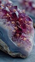 Natural purple amethyst crystal cluster with unique formations on geode in detailed close up photo