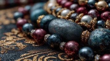 Discover intricate details of handmade jewelry laid on a textured fabric during a creative crafting session photo
