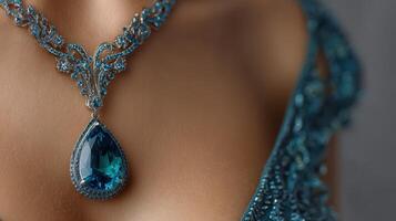 Luxurious turquoise necklace highlighting intricate designs on elegant garment worn during evening gala photo