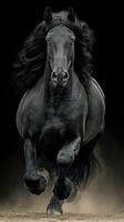 Majestic black horse galloping through sand with flowing mane in a dramatic setting photo