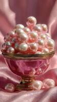 Assortment of pink pearls in an ornate bowl on a soft satin surface during a serene morning photo