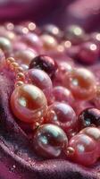 Colorful pearls resting elegantly on soft fabric create a stunning display of luxury and beauty photo
