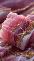 Beautifully carved pink quartz mineral with golden veins showcasing intricate patterns and hues in natural formation photo
