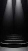 A black and white photo of a staircase with a spotlight shining on it