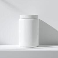 White jar with lid on a white surface photo