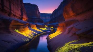 River Flowing Through Grand Canyon at Twilight with Colorful Sky photo