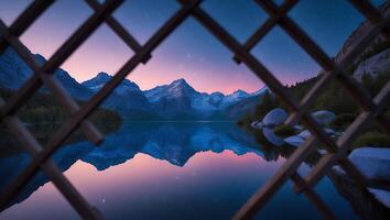 Reflecting Mountain Lake with Snowcapped Peaks and Colorful Twilight Sky photo