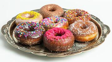 A silver plate with six donuts on it photo