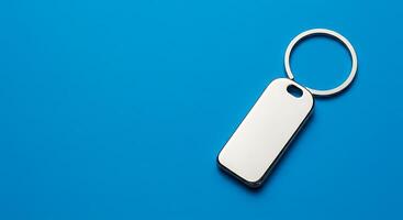 Keychain on blue background photo