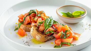 A plate with two slices of bread and a bowl of sauce photo