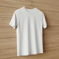 White t - shirt hanging on a wooden wall photo