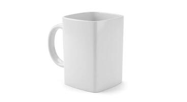 A white mug with a handle on a white surface photo