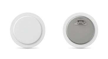 Two oval shaped objects with a metal clip on them photo