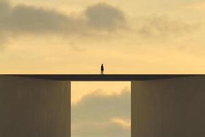 A man stands on a bridge over a large gap photo