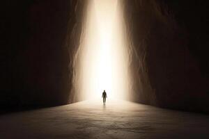 A person standing in the middle of a dark tunnel photo