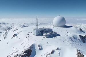 A large white dome on top of a snowy mountain photo